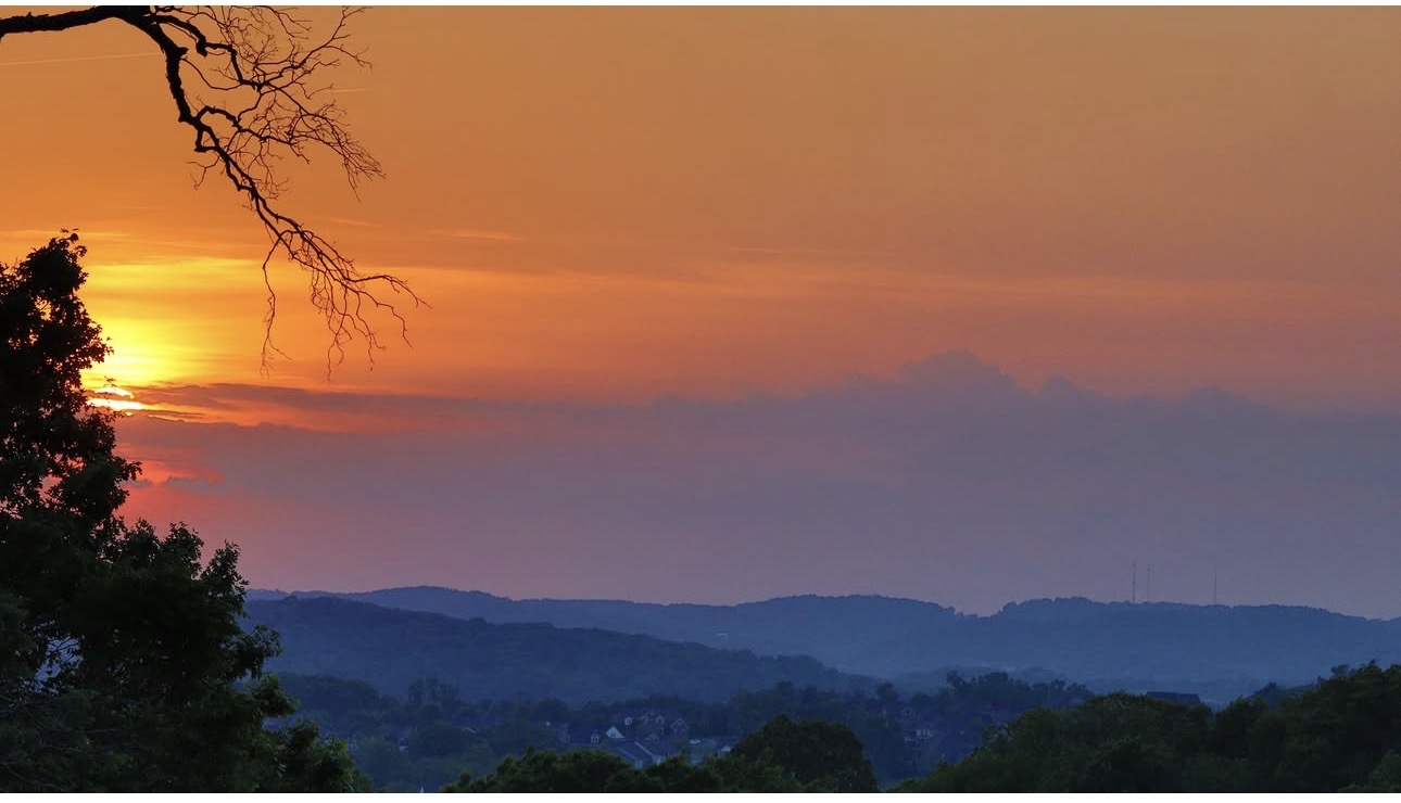 A glowing sunset over the Tennessee hills from Pleasant Wish