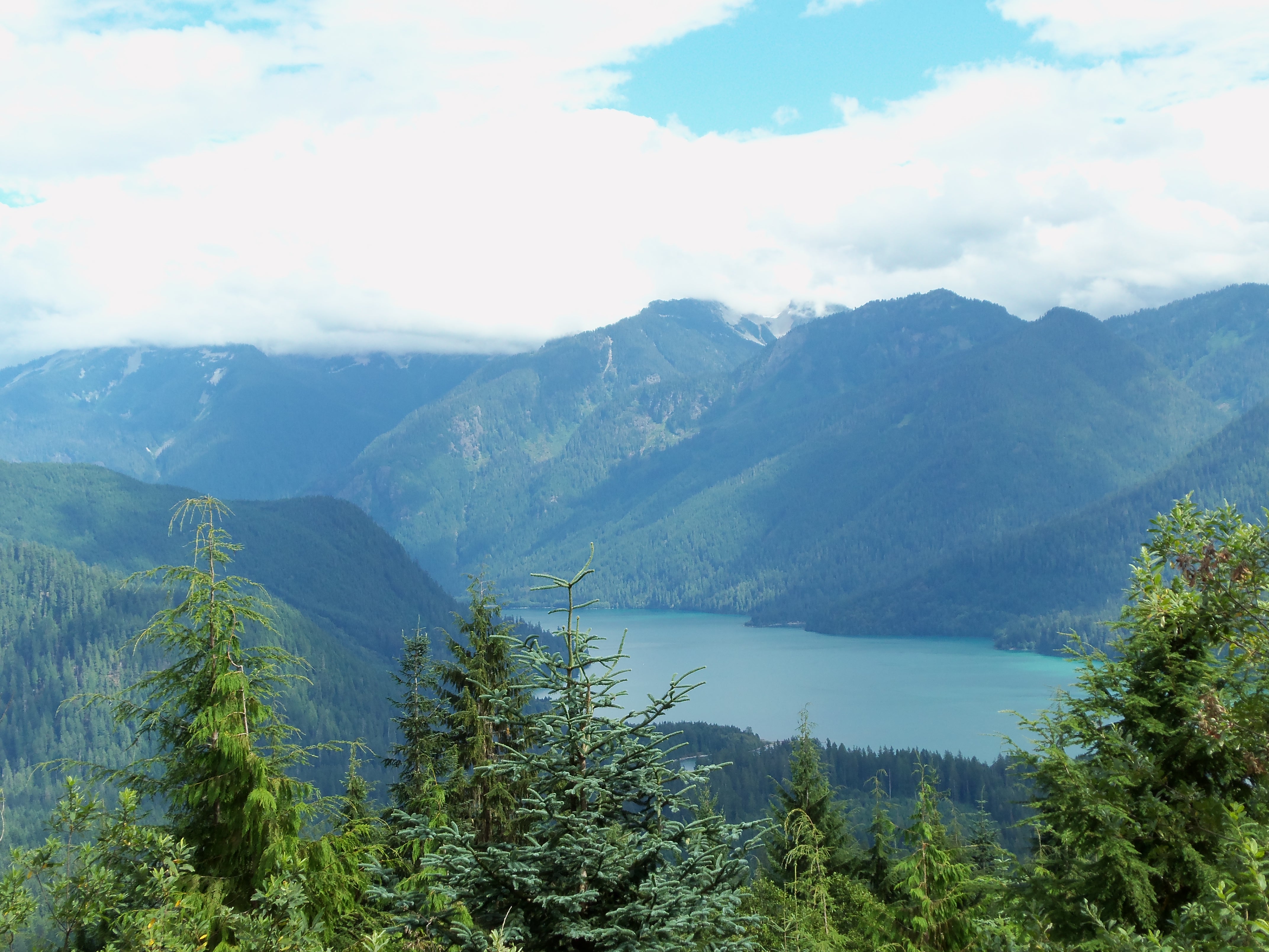 Clouds lifting from a mountain lake